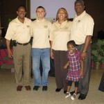 Curtis May with Mark Stapleton, Virginia and Al Liburd and their granddaughter, Genesis.
