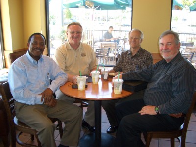 Curtis May with conference organizers Tom Pickett, Arnold Clauson and Robert Persky