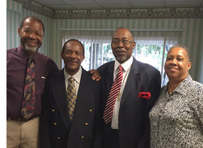 (l-r) Pastor Ron Washington, Curtis May, MacArthur Mickens and his wife, Fay