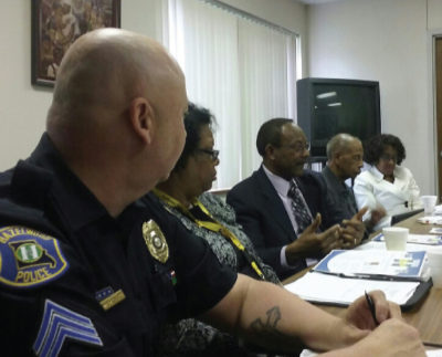 Curtis May leads discussion at NCCU Solutions Committee meeting with police and pastors