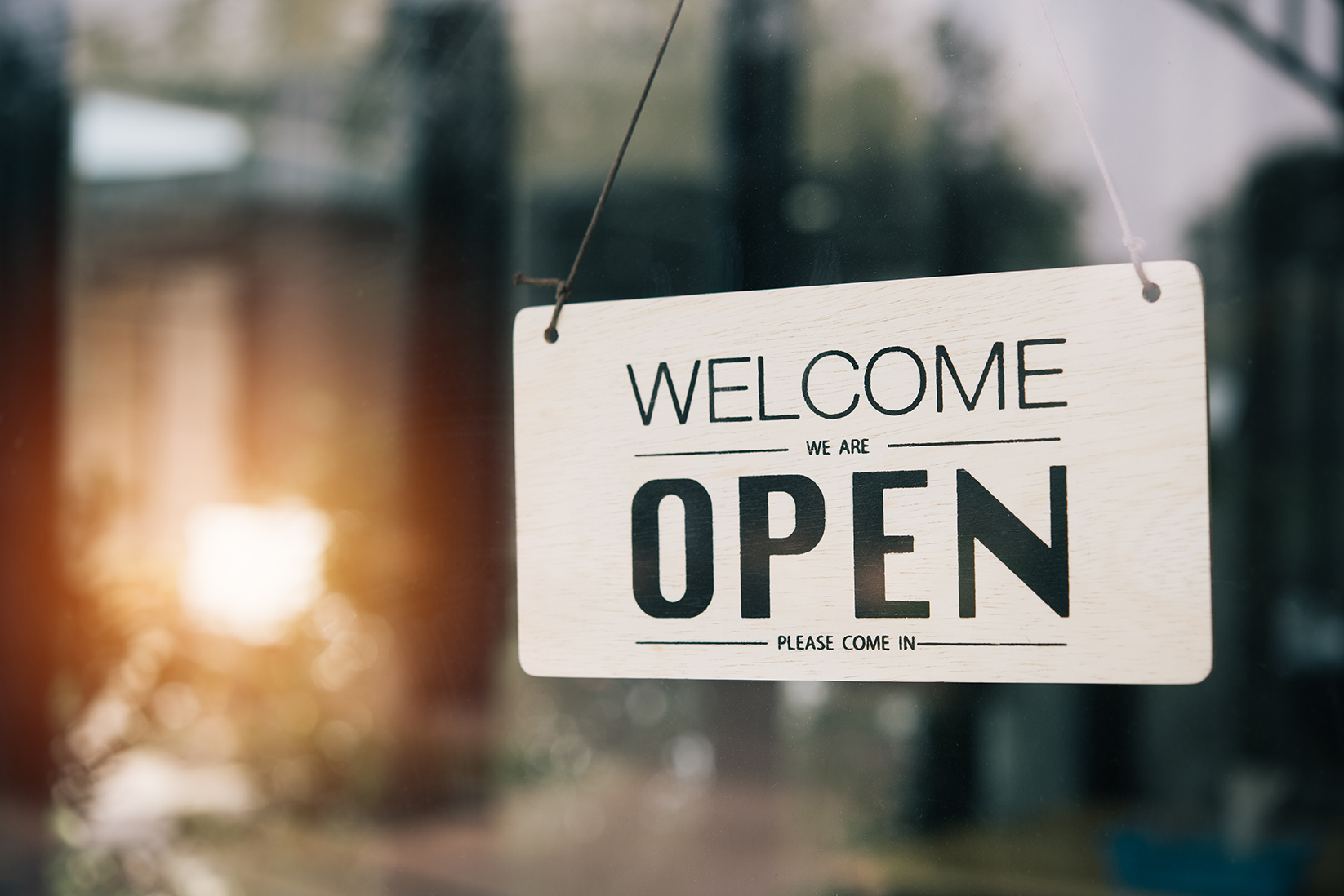 "Open" on cafe or restaurant hang on door at entrance. "Open" on cafe or restaurant hang on door at entrance.